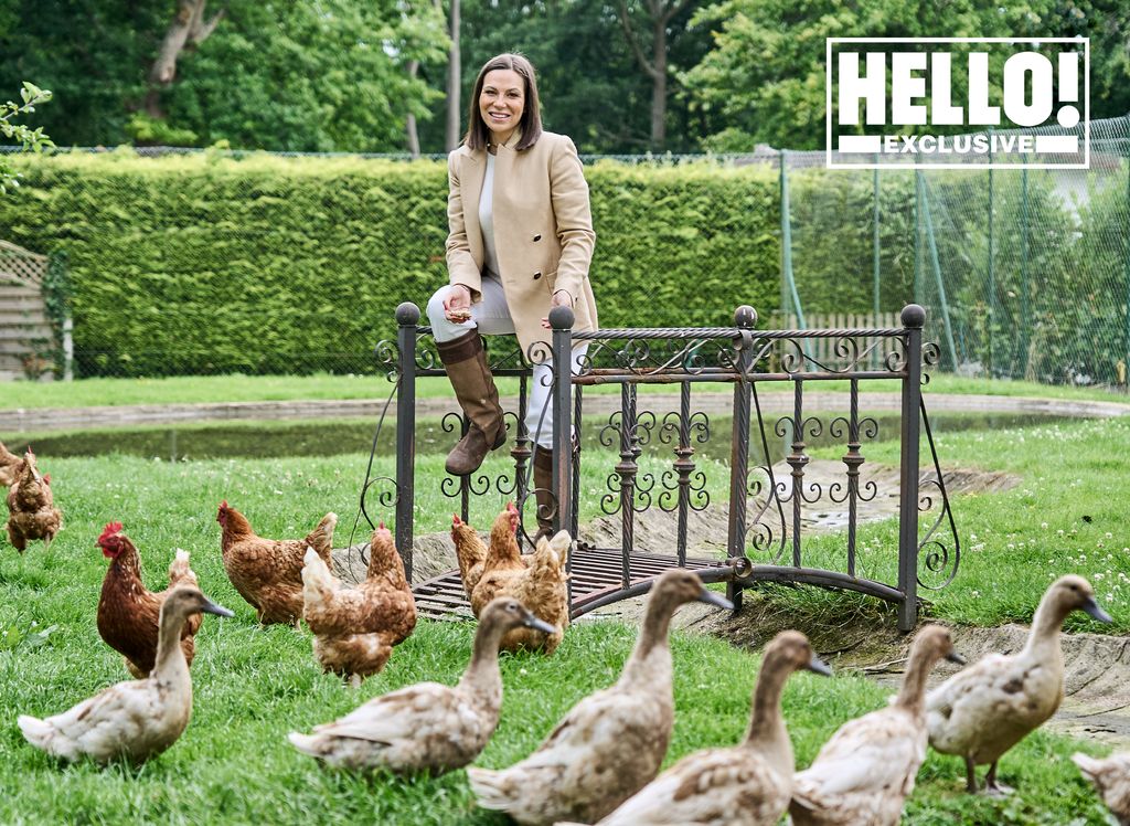 Lilia Mascolo posing with chickens and ducks at Surrey home Summerdown Manor