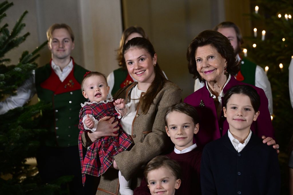 Queen Silvia posed with Princess Estelle as well as Princess Sofia's four children
