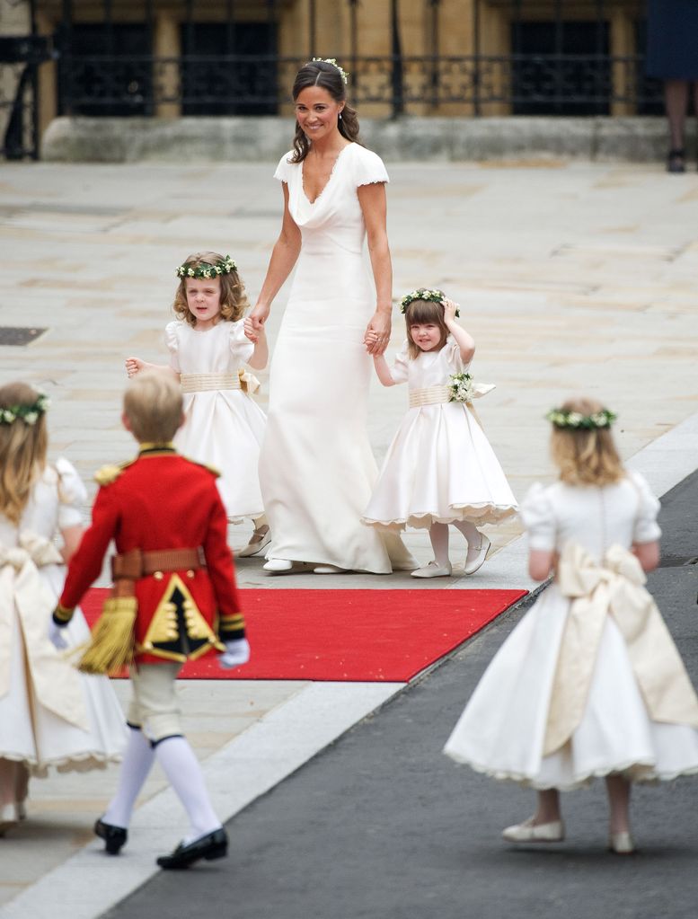 Apil 2011, Pippa Middleton with Grace van Cutsem (L) and Eliza Lopez (R) arrive for the marriage of Their Royal Highnesses Prince William Duke of Cambridge and Catherine Duchess of Cambridge at Westminster Abbey on April 29, 2011 in London, England. (Photo by Samir Hussein/WireImage)