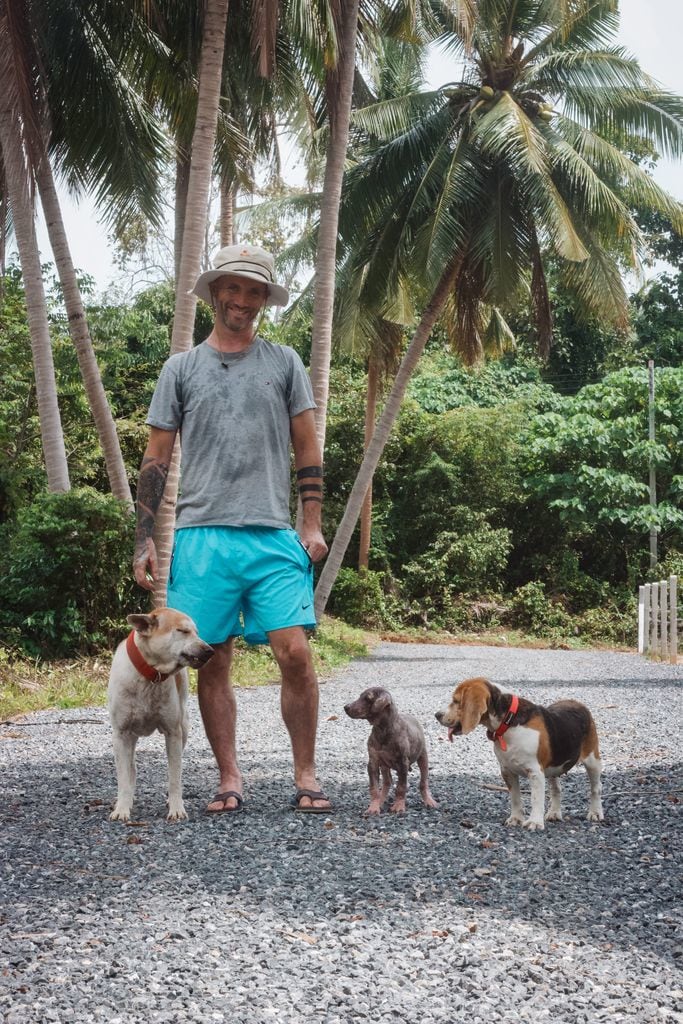 Niall Harbison in Thailand with his dogs
