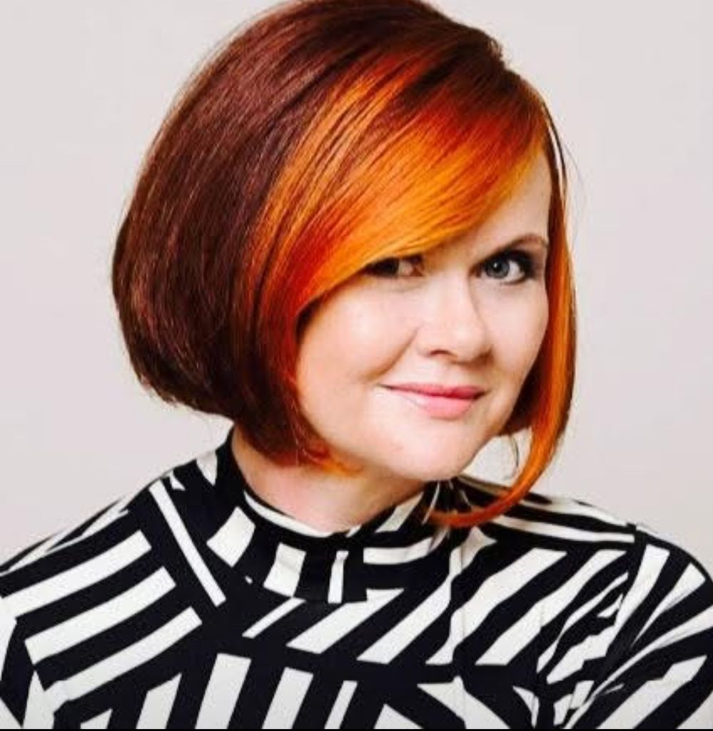 Woman with bold face framing bob