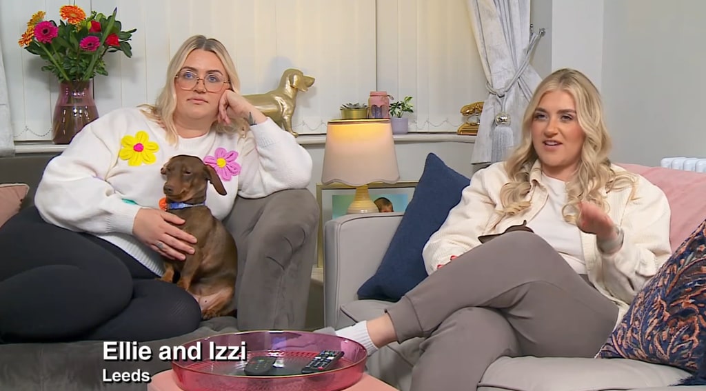 Ellie Warner and Izzi Warner sitting on two chairs while filming Gogglebox at Izzi's home in Leeds