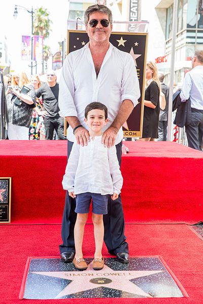 simon cowell with son eric on walk of fame