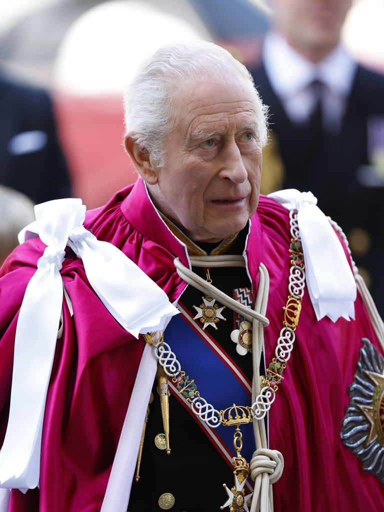 King Charles looks up at the Order of the Bath Service at Westminster Abbey
