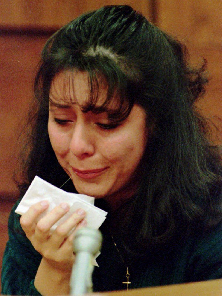 Lorena Bobbitt cries as she testifies about the night she cut her husband John Wayne Bobbitt's penis off
