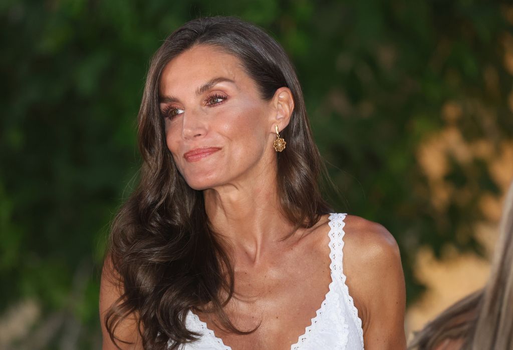Queen Letizia wearing white strappy dress
