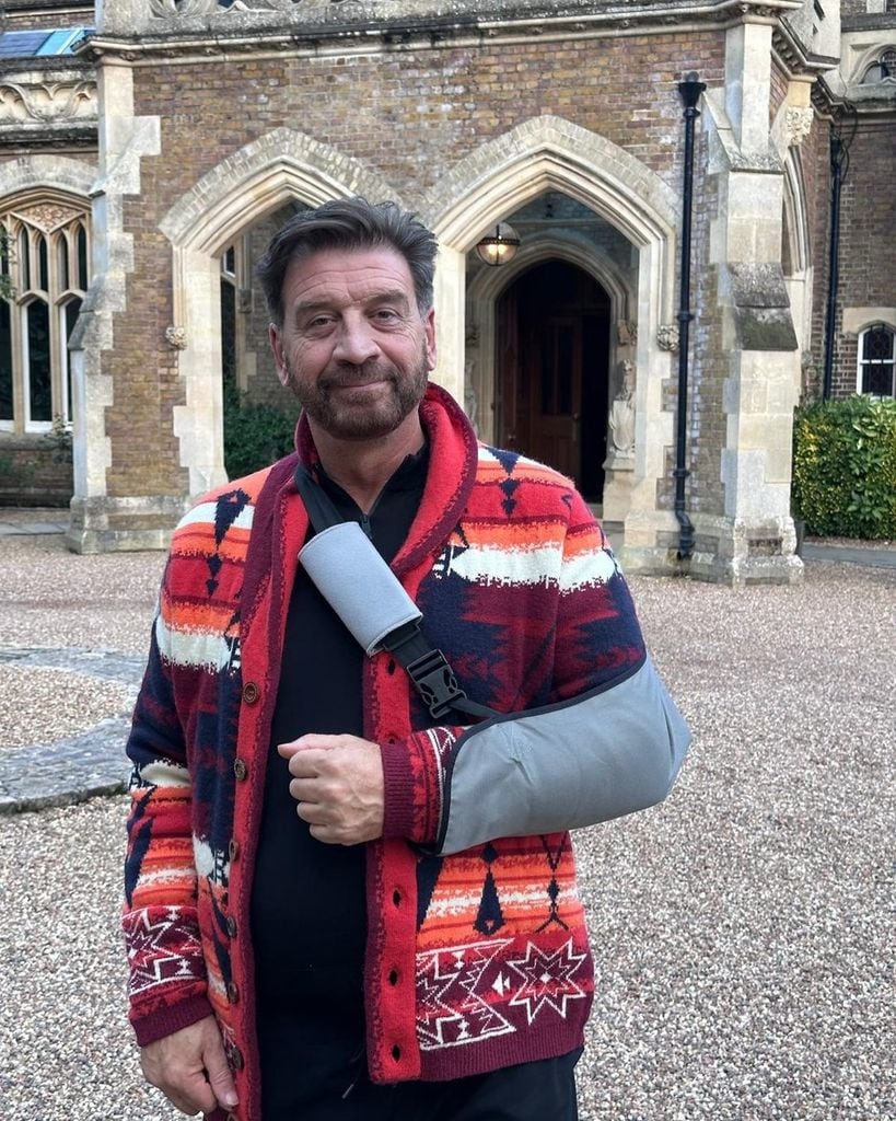 Nick Knowles wearing his arm in a sling