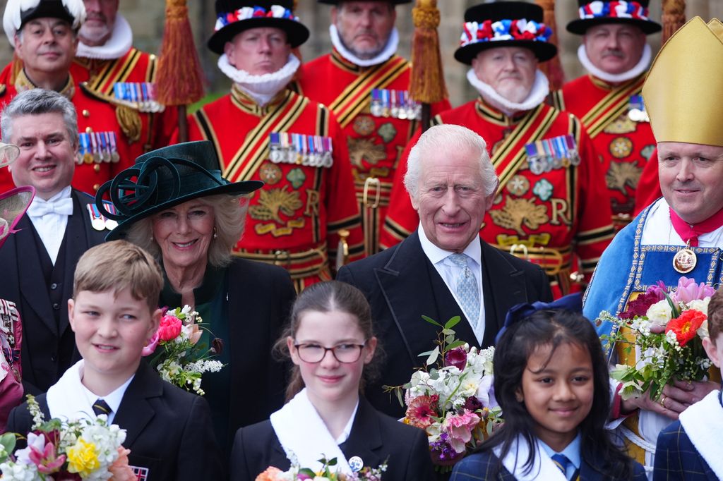 King and Queen posing for group photo outside Durham Cathedral
