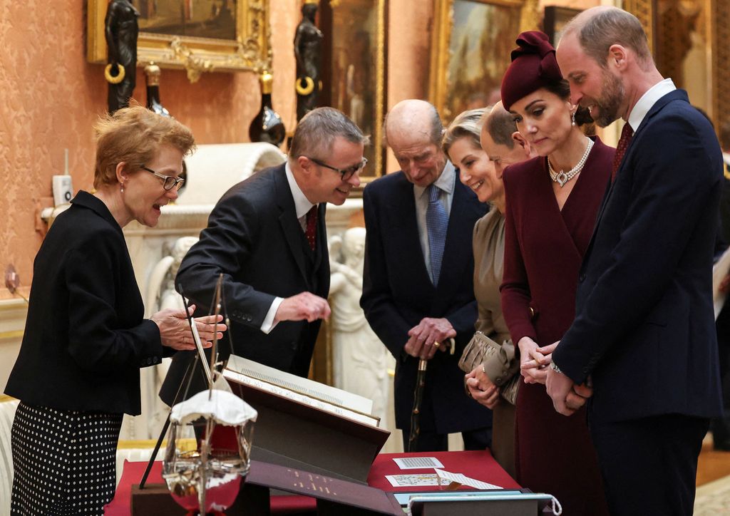 Prince William, Prince of Wales, Catherine, Princess of Wales, Prince Edward, Duke of Edinburgh, Sophie, Duchess of Edinburgh in the Picture Gallery at Buckingham Palace in London on December 3, 2024