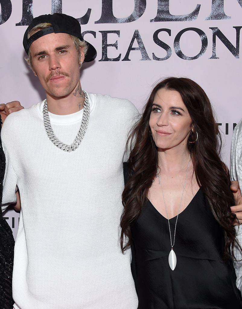 Justin Bieber (L) and his mother Pattie Mallette arrive for YouTube Originals' "Justin Bieber: Seasons" premiere at the Regency Bruin Theatre in Los Angeles on January 27, 2020
