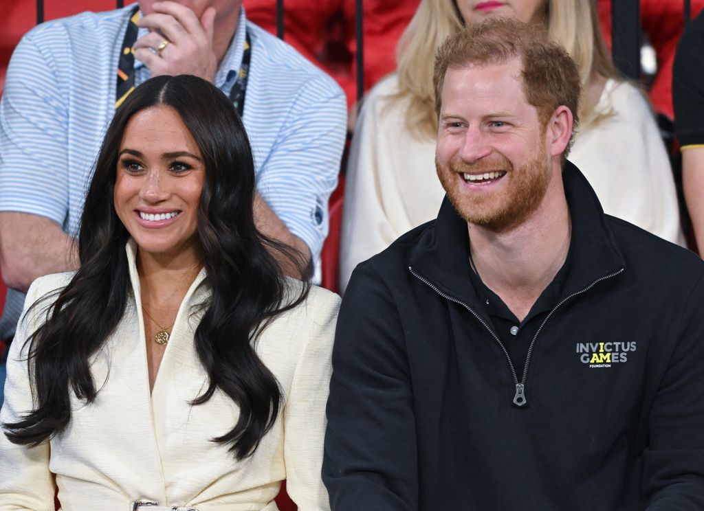 Prince Harry, Duke of Sussex and Meghan, Duchess of Sussex attend the sitting volleyball event during the Invictus Games at Zuiderpark on April 17, 2022 