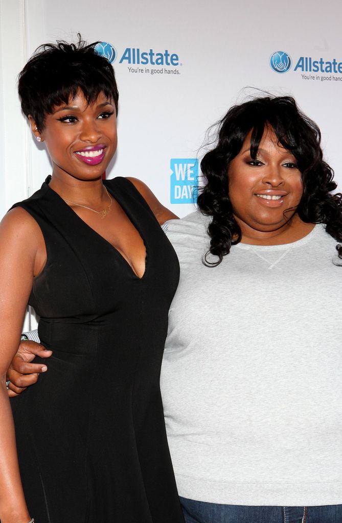 Jennifer Hudson and her sister Julia pose for photos on the red carpet during "We Day" at the Allstate Arena on April 30, 2015 in Rosemont, Illinois
