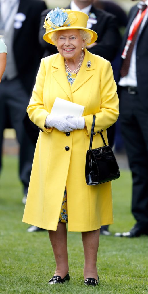 Queen Elizabeth II watching her horse 'Fabricate' run at Ascot Racecourse 