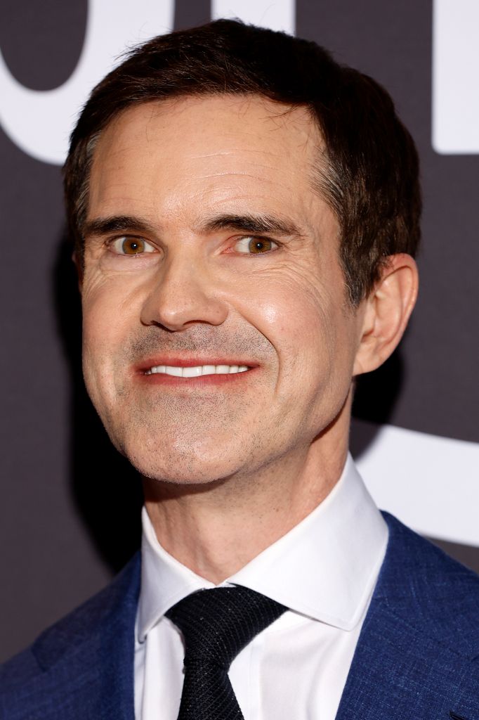 Headshot of Jimmy Carr smiling while attending photocall