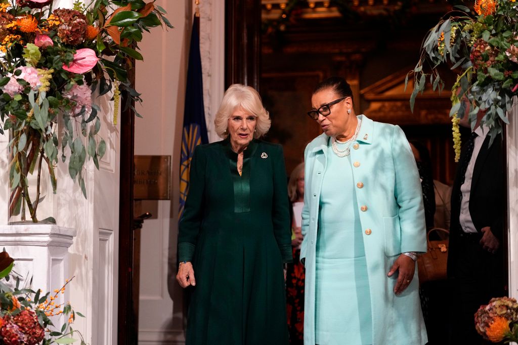 Queen Camilla is a vision in green