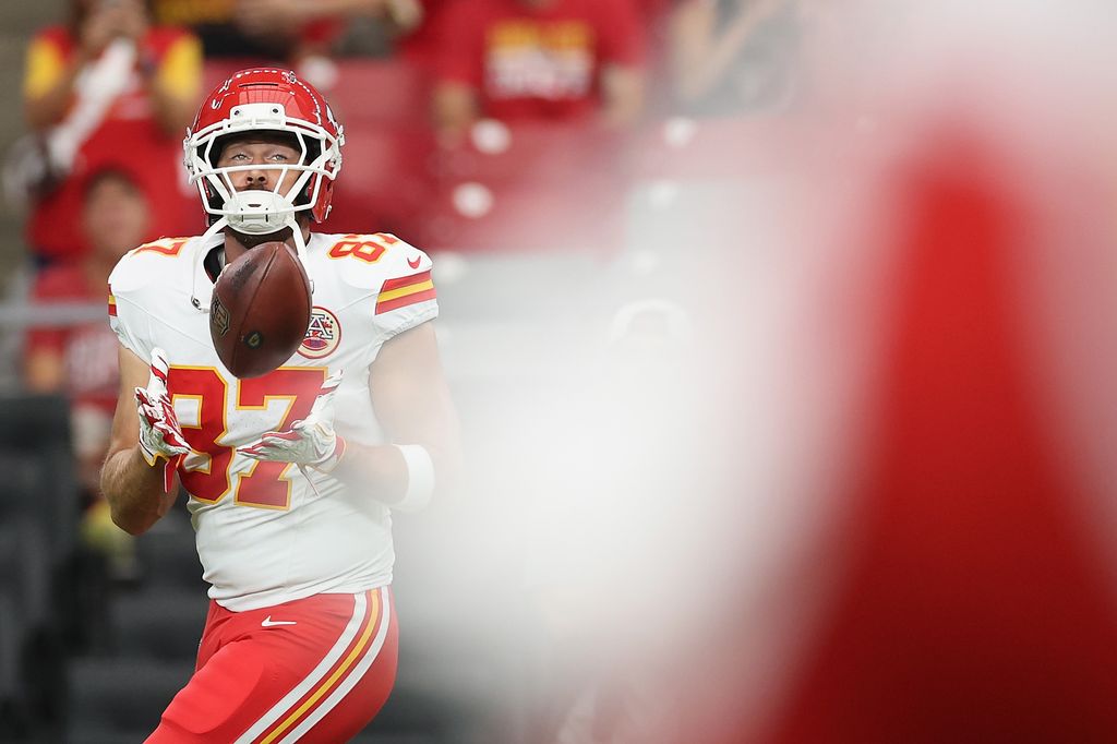 Tight end Travis Kelce #87 of the Kansas City Chiefs warms up before the NFL Preseason 2025 game against the Arizona Cardinals at State Farm Stadium on August 09, 2025 in Glendale, Arizona.