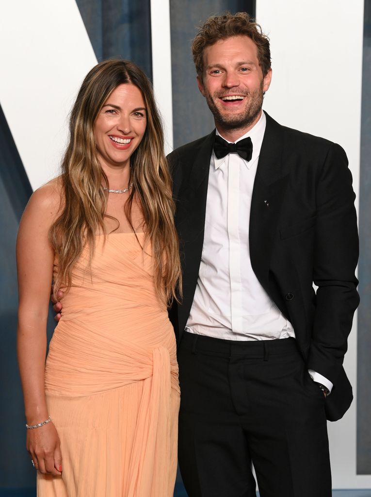 Amelia Warner and Jamie Dornan at the 
Vanity Fair Oscar Party, 2022
