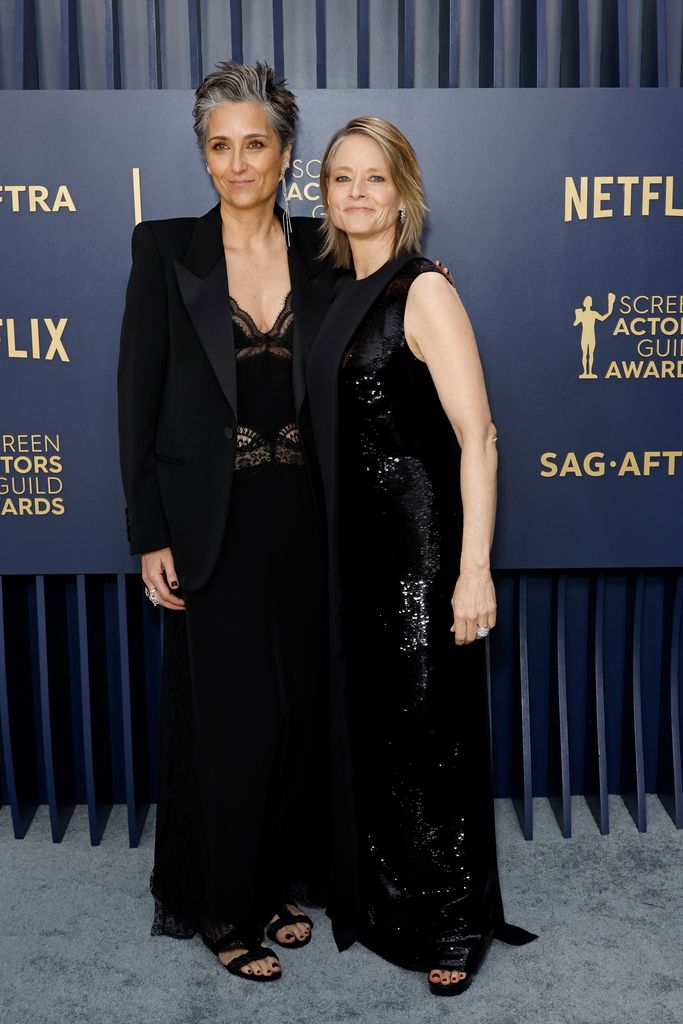 Alexandra Hedison and Jodie Foster attend the 30th Annual Screen Actors Guild Awards at Shrine Auditorium and Expo Hall on February 24, 2024 in Los Angeles, California.