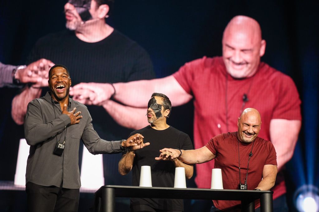 Michael and Jay on stage with David Blaine, David is blindfolded