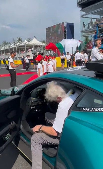 michael douglas climbing into safety car italian grand prix