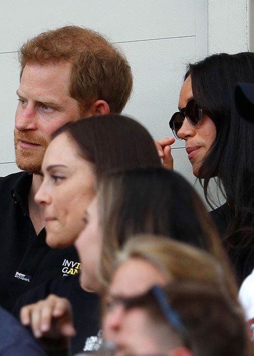 harry and meghan watching the game