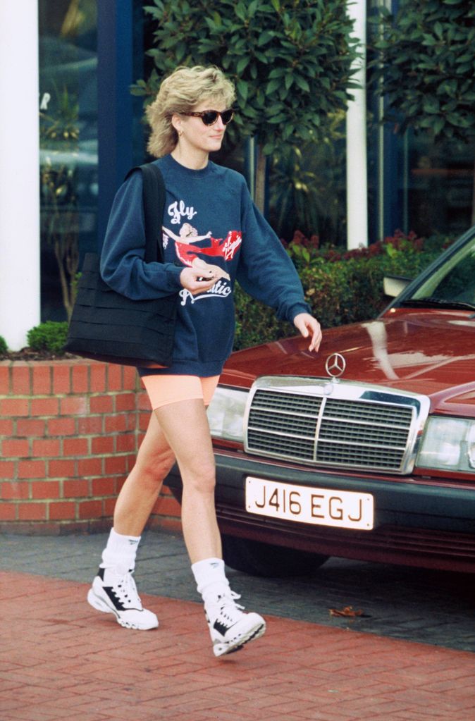 Princess Diana wearing baggy sweatshirt and cycling shorts 