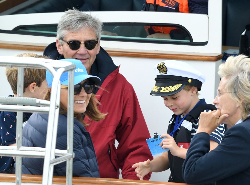Carole and Michael Middleton on board a boat with Prince George at King's Cup Regatta, 2019