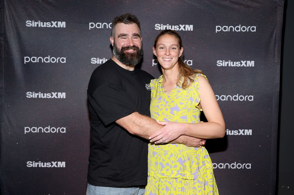 jason kelce holding kylie kelce around the waist
