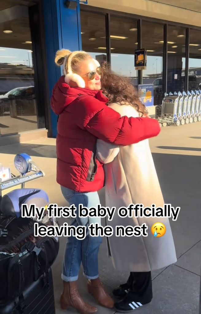 Still from a TikTok shared by Amy Robach on January 2023 where she is hugging her daughter Ava goodbye as she prepares to start her semester abroad