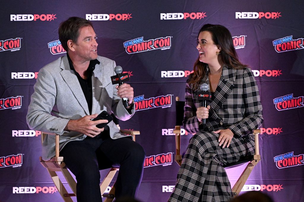 Michael Weatherly and Cote de Pablo speak onstage during the NCIS: Tony & Ziva Panel at New York Comic Con at Jacob Javits Center on October 09, 2025 in New York City.