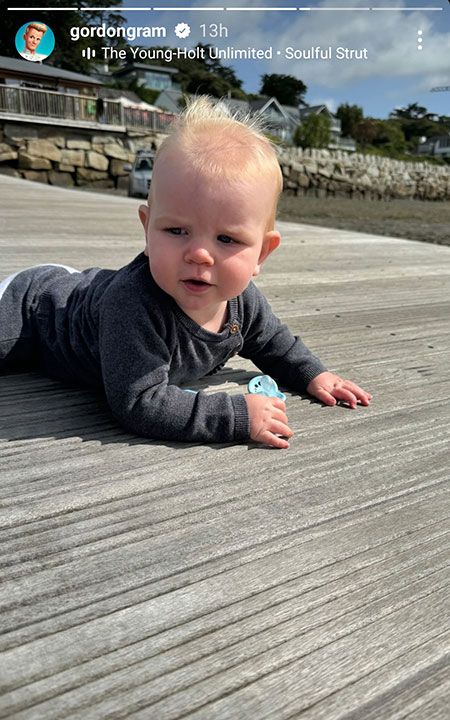 baby boy crawling outside