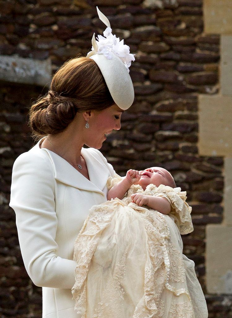 Kate Middleton smiling at Princess Charlotte on christening day