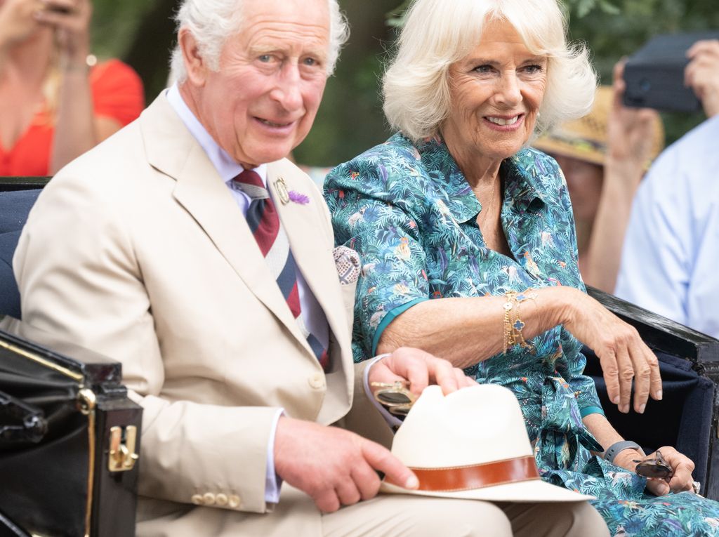 camilla and charles in summer in a carriage