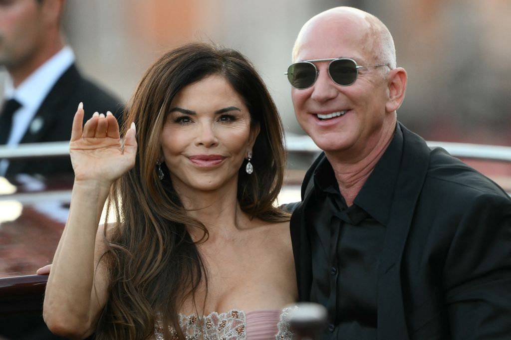 Jeff Bezos and spouse Lauren Sanchez Bezos leave the Aman Hotel on the third day of their wedding festivities,