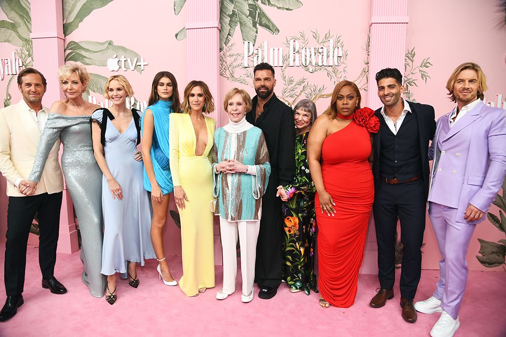 Ricky Martin with his Palm Royale co-stars on the pink carpet 