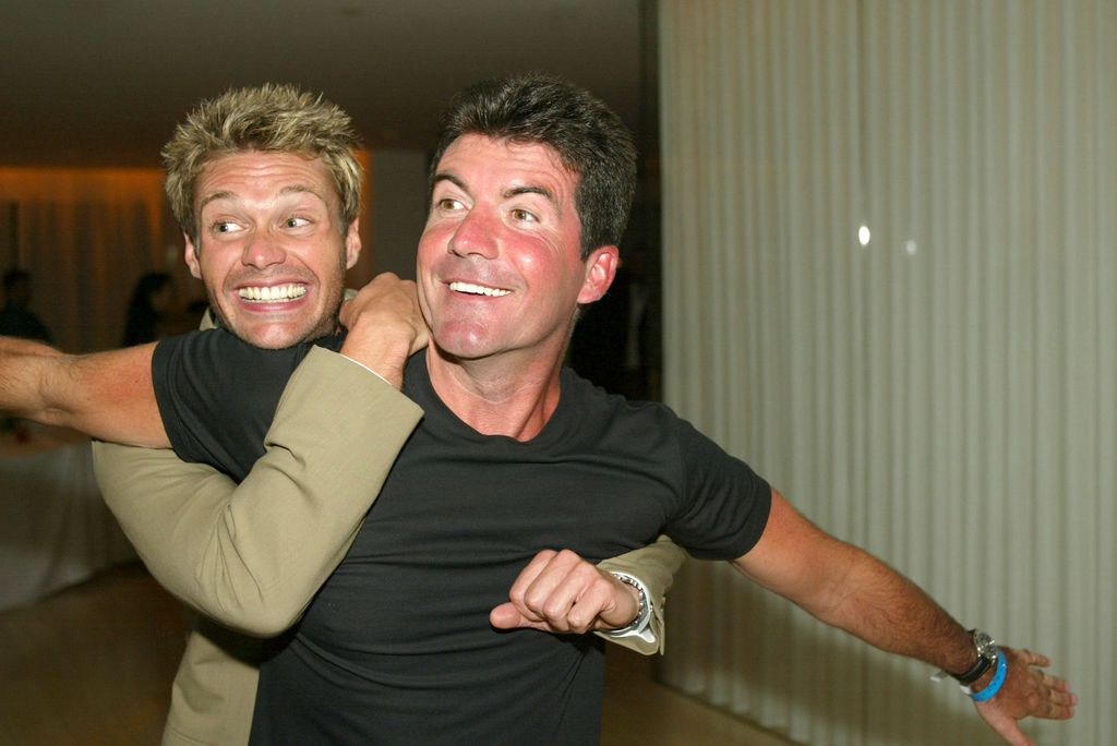 Ryan Seacrest and Simon Cowell at the Fox Network's TCA Summer Tour Party at The Mondrian Hotel in West Hollywood, Ca. Monday, July 22, 2002