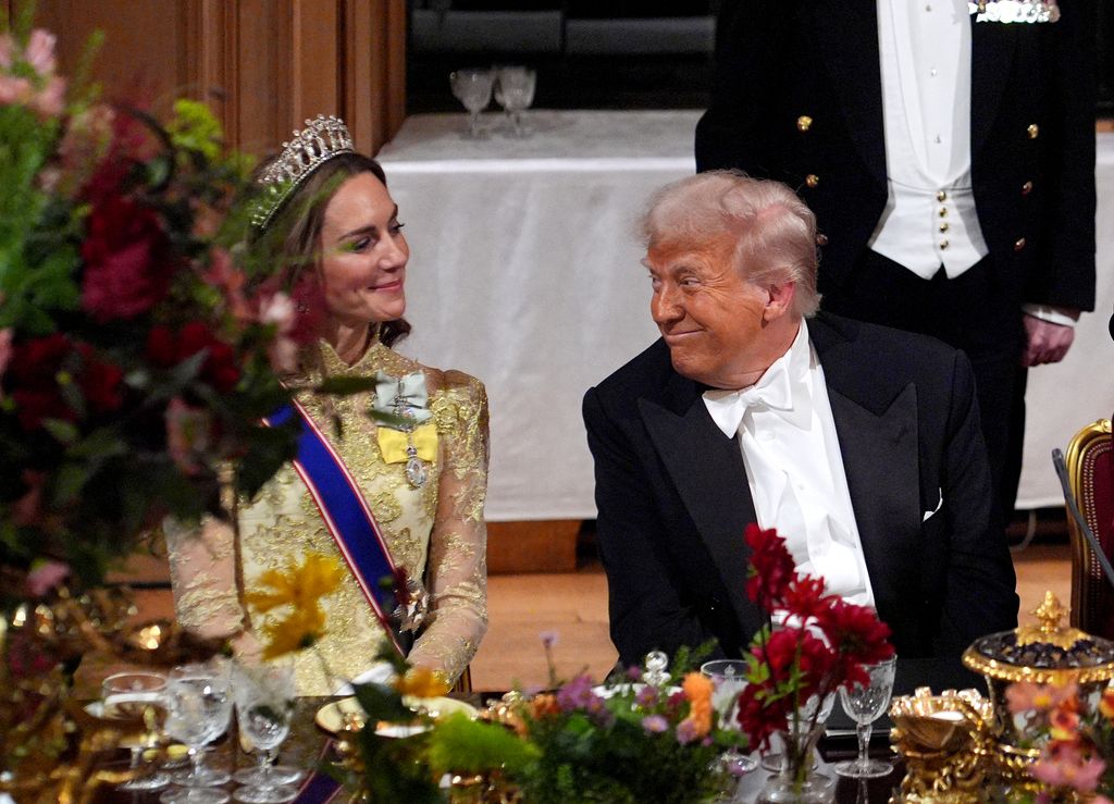 US President Donald Trump smiles at Britain's Catherine, Princess of Wales during a State Banquet at Windsor Castle, in Windsor, on September 17, 2025, during the US President's second State Visit. US President Donald Trump arrived in Britain for an unprecedented second State Visit, with the UK government rolling out a royal red carpet welcome to win over the mercurial leader. (Photo by Yui Mok / POOL / AFP) (Photo by YUI MOK/POOL/AFP via Getty Images)          