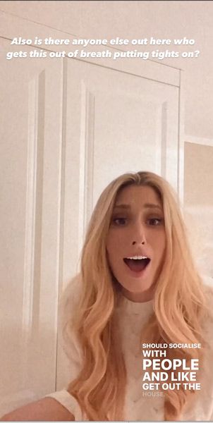 Stacey Solomon putting tights on at home.