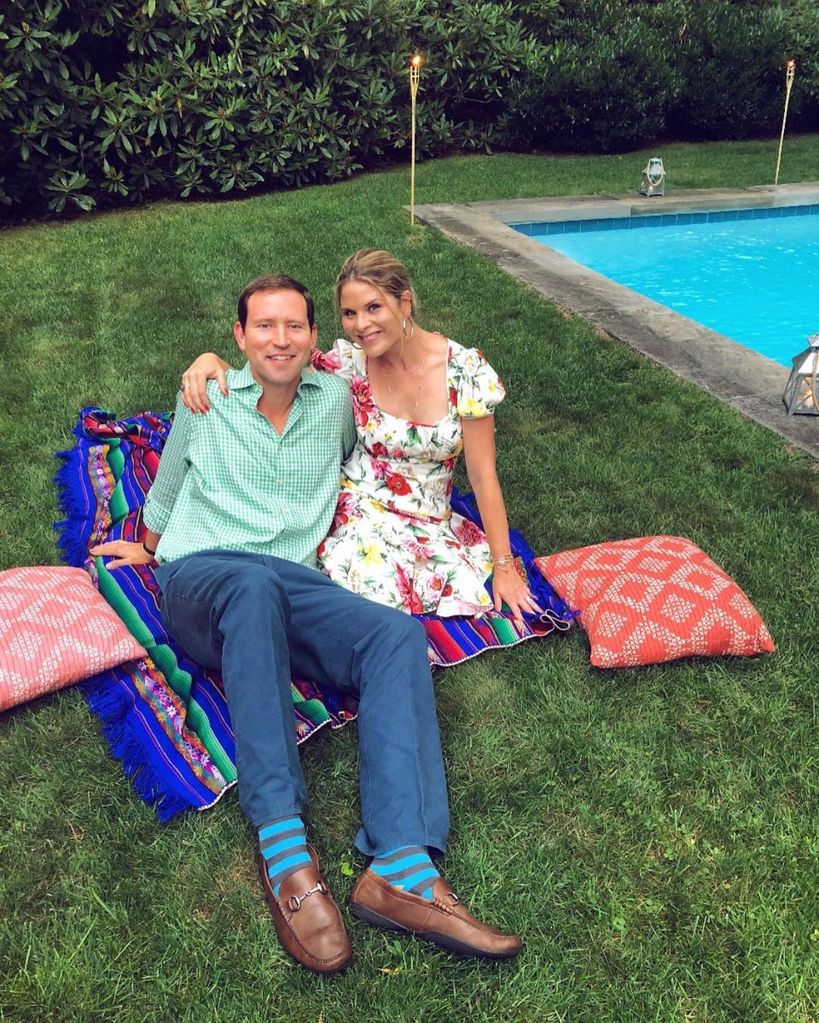Jenna and her husband Henry Hager by their pool