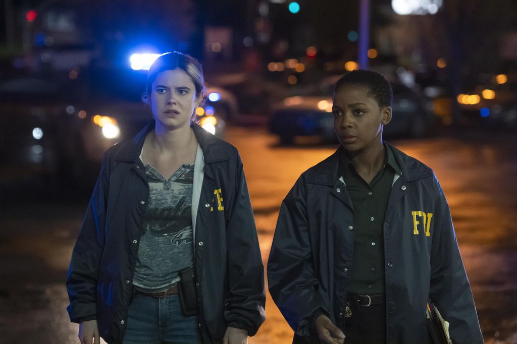 two fbi officers in dark street