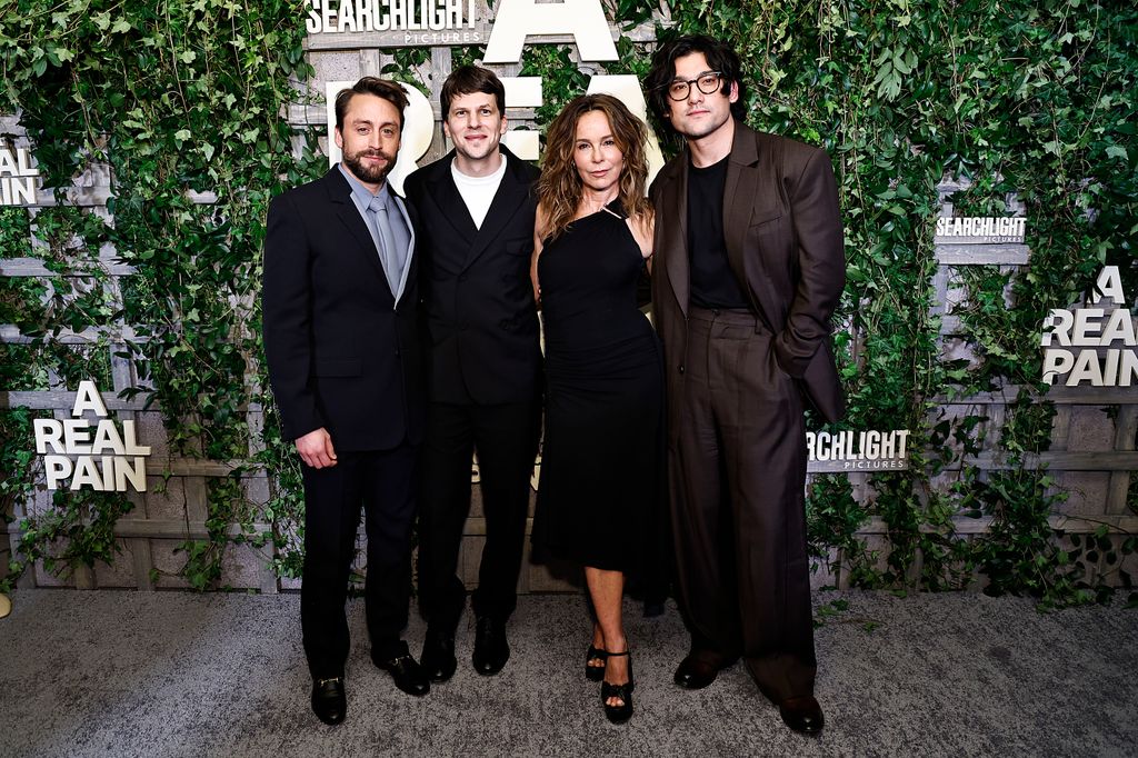 Kieran Culkin, Jesse Eisenberg, Jennifer Grey and Will Sharpe pose