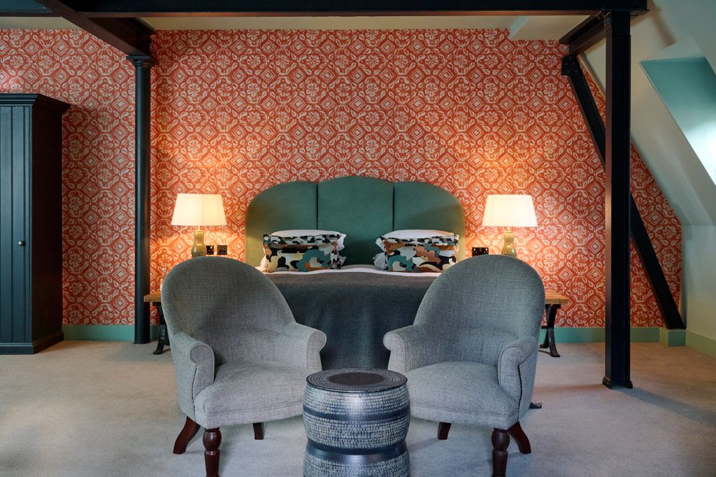 hotel room with chairs and table