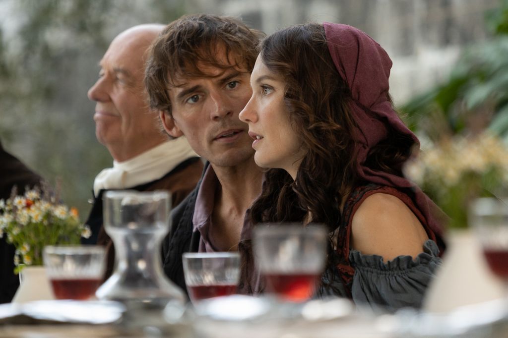 man and woman sitting at table