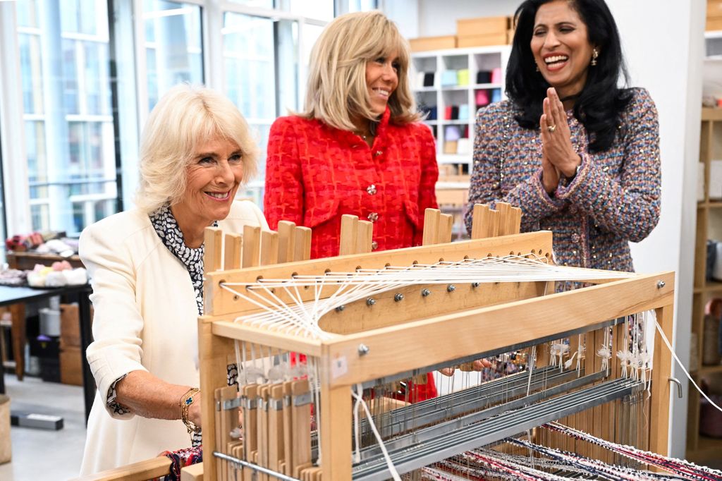 Britain's Queen Camilla and French President's wife Brigitte Macron, next to CEO of Chanel Leena Nair (R), visit the 19M Campus