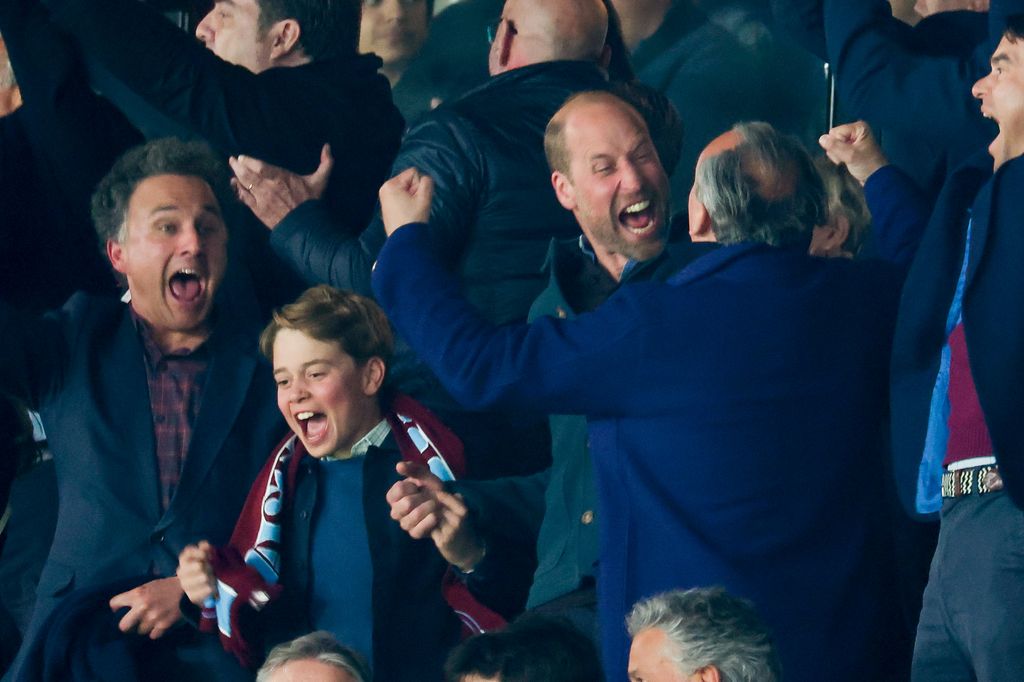 George and William cheering at Aston Villa match