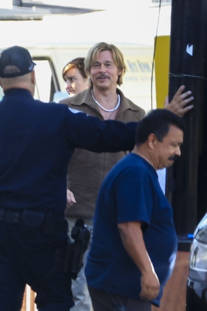 brad pitt on set of the adventures of cliff booth