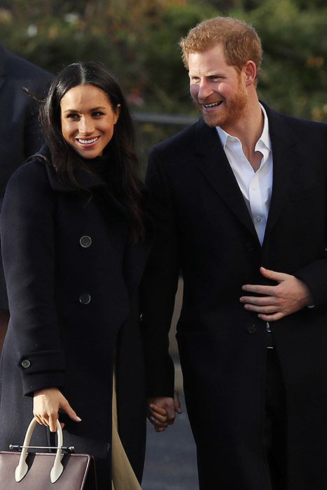 prince harry and meghan holding hands