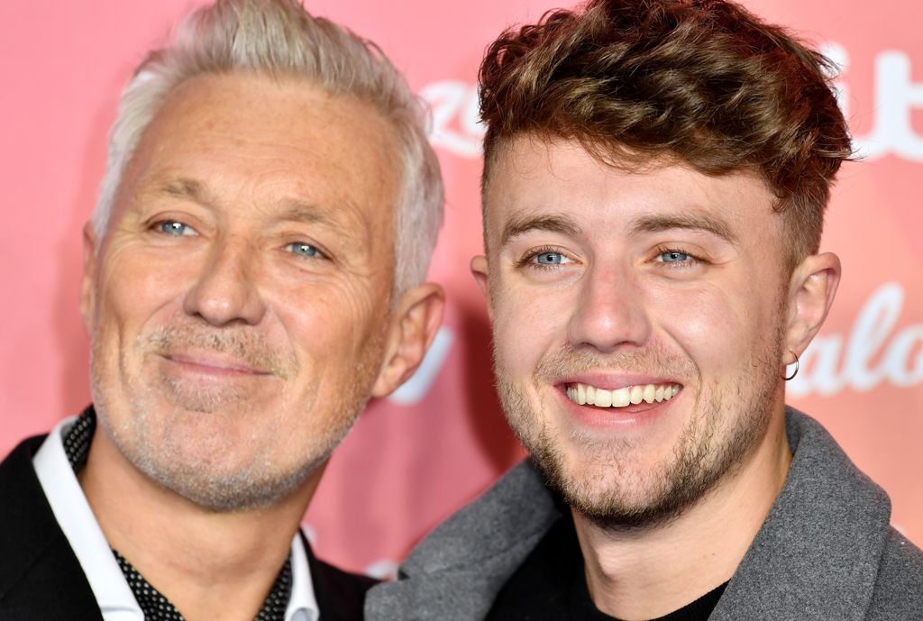 Martin and Roman Kemp smiling on the red carpet