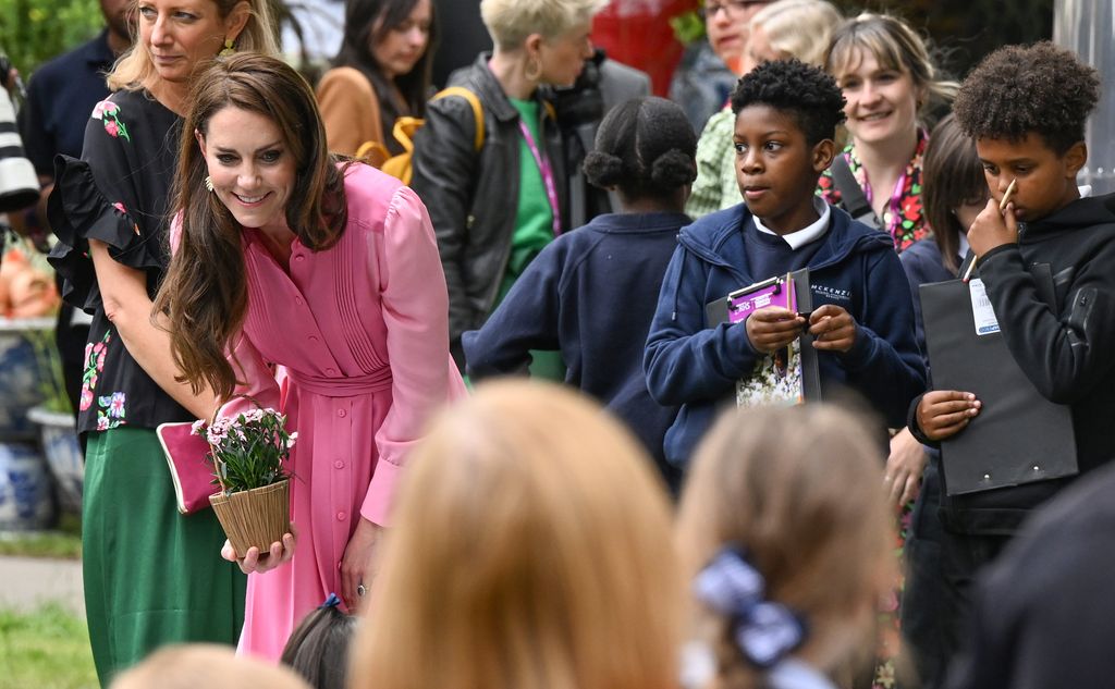 Kate Middleton carries a potted flower at the Chelsea Flower Show 2023