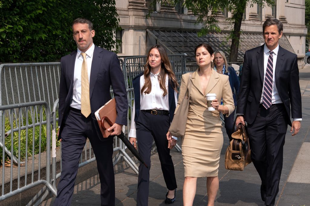 Charlie Javice (2nd from L) is seen arriving at court on June 6, 2023 in New York, New York